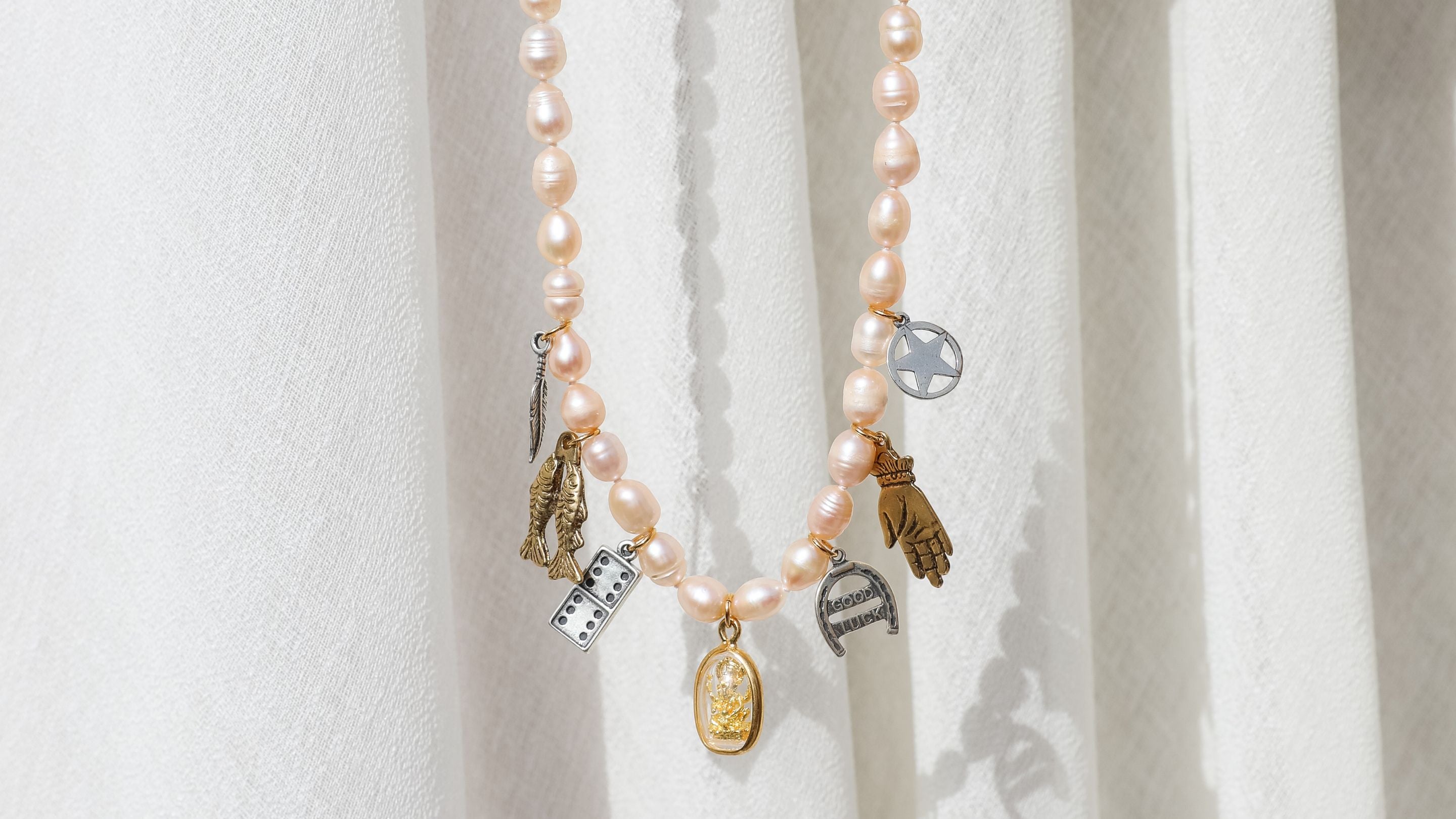pearl necklace with multi charms