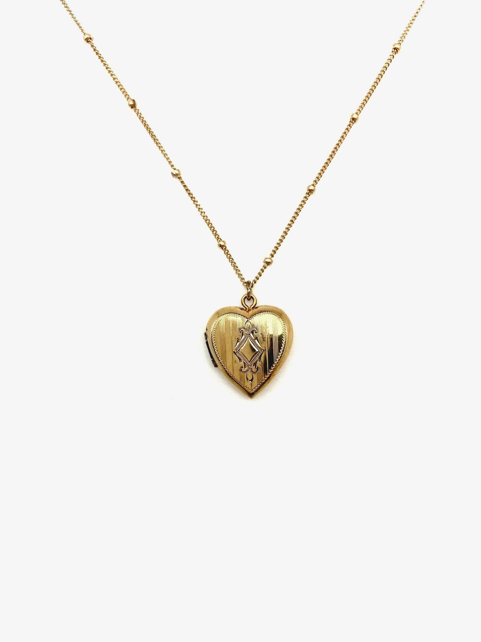 Violet Locket - Stone Cooper