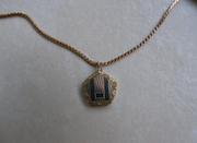 Elka Two-Toned Pentagon Locket